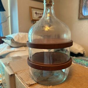 This is 3 piece glass and wood vintage candy holder.